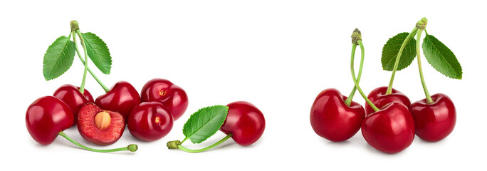 Some cherries with leaf and cut closeup isolated on white background