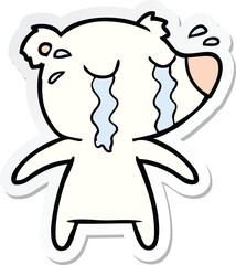sticker of a cartoon crying polar bear