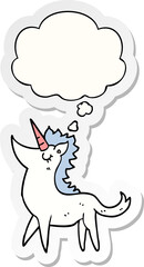 cartoon unicorn with thought bubble as a printed sticker