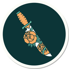sticker of tattoo in traditional style of a dagger and flowers