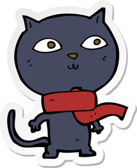 sticker of a cartoon black cat wearing scarf