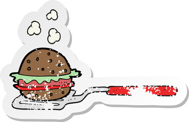 retro distressed sticker of a cartoon spatula with burger