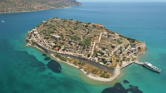 Top view of Spinalonga island with calm sea. Here were lepers humans with the Hansen's disease, gulf of Elounda, Crete, Greece.