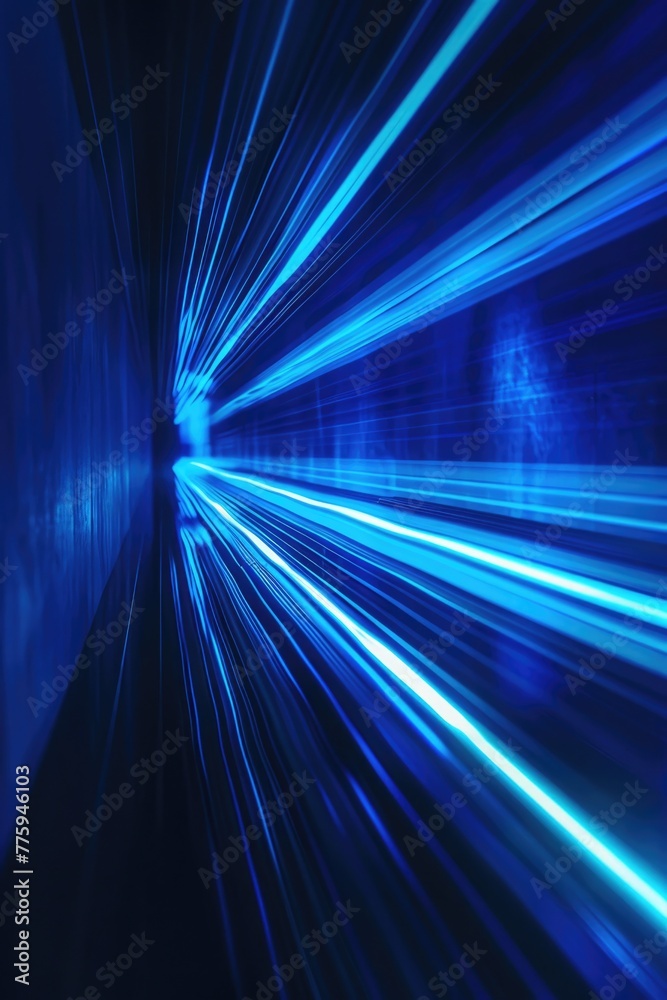 Poster a train moving through a tunnel illuminated with blue lights. suitable for transportation or technol