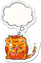 cute cartoon cat with thought bubble as a distressed worn sticker