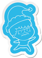 quirky cartoon  sticker of a annoyed man wearing santa hat