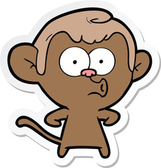 sticker of a cartoon hooting monkey