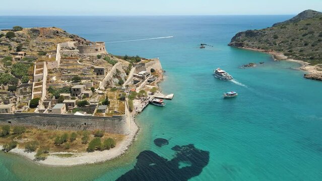 Aerial drone view of an old Venetian fortress island and former Leper colony. Spinalonga, Crete, Greece.