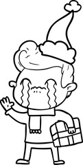 hand drawn line drawing of a man crying wearing santa hat