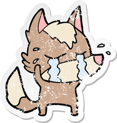 distressed sticker of a cartoon crying wolf