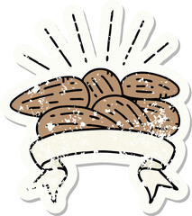 worn old sticker of a tattoo style almonds