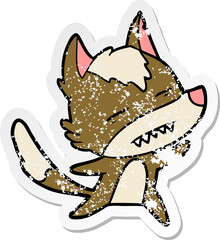 distressed sticker of a cartoon wolf showing teeth whilst dancing