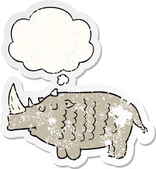 cartoon rhinoceros with thought bubble as a distressed worn sticker