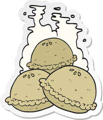 sticker of a cartoon hot pies