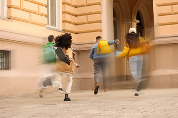 Being late. Group of students running for class. Motion blur effect