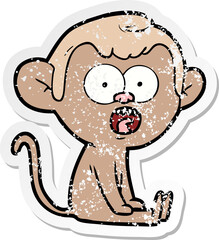 distressed sticker of a cartoon shocked monkey