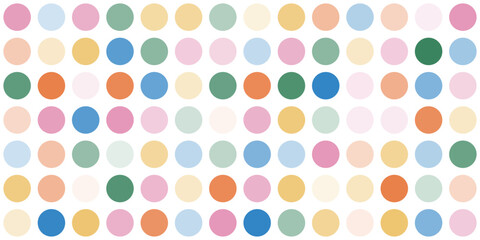 Fun abstract dotted background in rainbow colors. Faded colorful polka dots pattern. Circles confetti on beige background. Retro horizontal backdrop