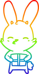 rainbow gradient line drawing of a curious bunny cartoon with present
