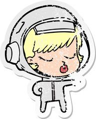 distressed sticker of a cartoon pretty astronaut girl pointing the way