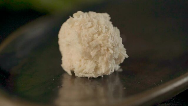 Bowl of condensed milk with coconut