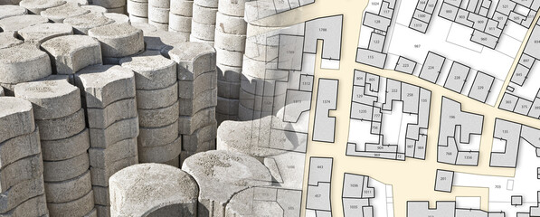 Stack of concrete self-locking flooring blocks on wooden pallet in a construction site used in building activity to create permeable floors to rain water - concept with imaginary city map
