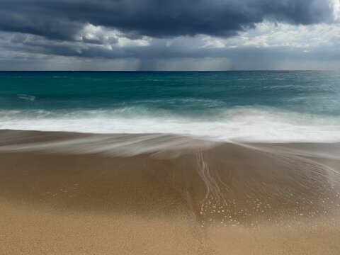 Beautiful long exposure shot fo a sea with flowing waves