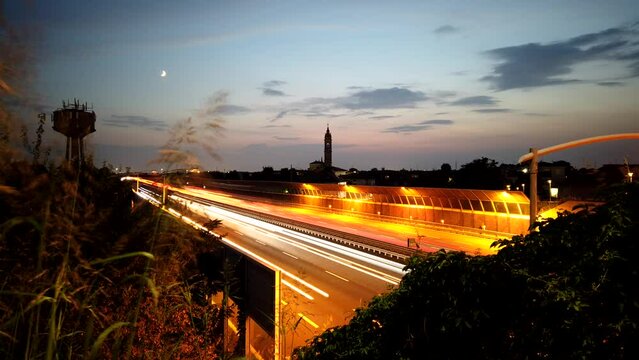 Time-lapse with longe exposure of traffic on a road with light trails