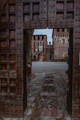 Vertical shot of the historic Soncino's Castle and grounds in Italy