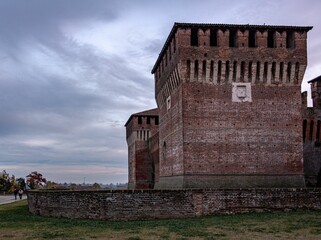 Beautiful shot of the historic Soncino's Castle and grounds at sunset in Italy