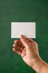 Blank White Card Held, Green Background Copy Space