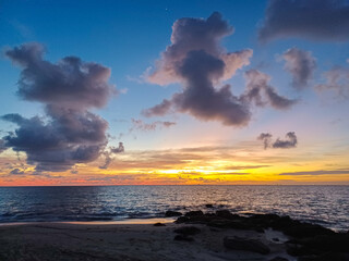 Naklejka na ściany i meble Sunrise in a Caribbean sea