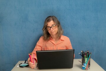 Female with laptop computer working from home or office