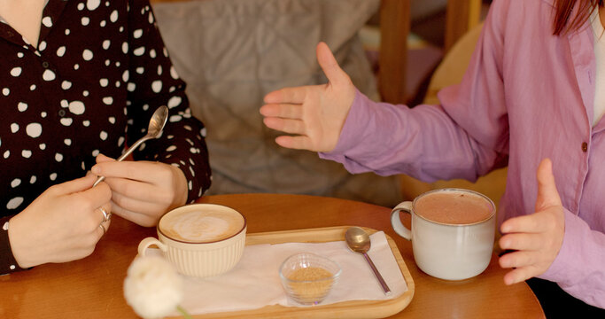 Communication no face people during breakfast or brunch involves sipping coffee or cocoa while engaging in conversation. Cozy, warm and relaxed atmosphere for strengthens interpersonal relationships.