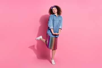 Full length photo of pretty cheerful lady dressed denim outfit having fun dancing emtpy space...