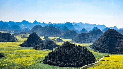 Serene valley with a river and mountains in  Loupin Rooster Hills, China