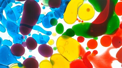 Freeze Motion Shot of Moving Color Oil Bubbles on White Background