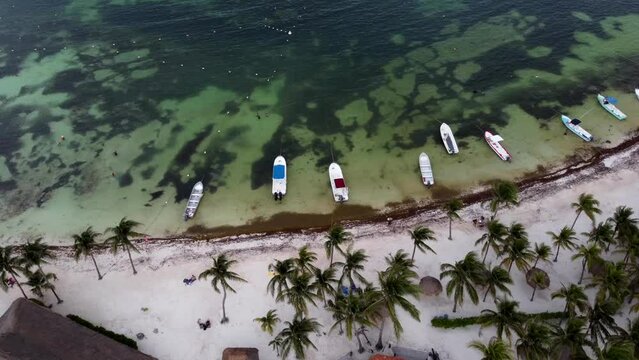 Drone view of a beautiful sea in Akumal, Mexico on a sunny day