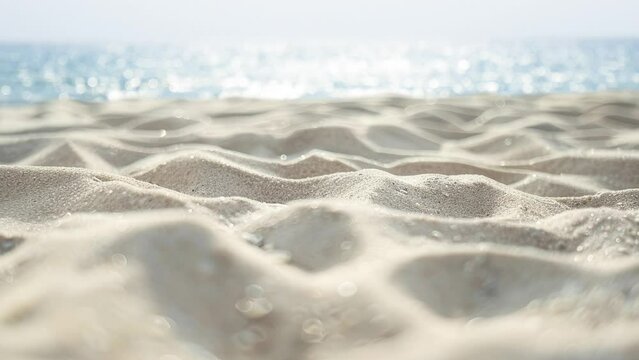 summer tropical beach background, focus on white clean sand beach, blur ripple wave at background