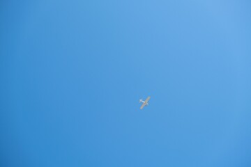 White airplane in blue sky