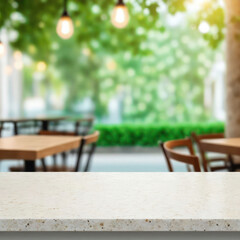 Fototapeta na wymiar Empty stone tabletop on blurred cafe bokeh. Layout for design.