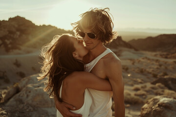 Fototapeta na wymiar A photo of a young man with messy hair and sunglasses kissing a woman in the desert during golden hour on a summer day with natural light
