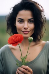 Naklejka premium Portrait of a woman in a poppy field. Vertical photo. Generative AI.