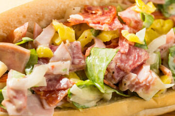 Naklejka premium Trendy Homemade Chopped Italian Sub Sandwich