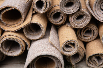 Cut up and rolled old carpets.