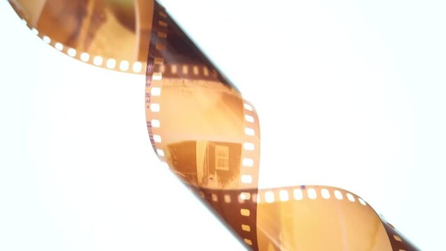 spiral photographic film, vintage ribbon of photographic film on a white background
