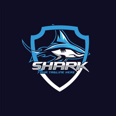 Sharks mascot logo design for sport or e-sport logo isolated on blue background Shark logo design template. Vector illustration. © Graphic Design