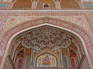The highly Colorful and intricately painted Ganesh Pol Gate in Amber Fort ( Amer Fort ) Jaipur, Rajasthan, India 