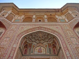 The highly Colorful and intricately painted Ganesh Pol Gate in Amber Fort ( Amer Fort ) Jaipur, Rajasthan, India 