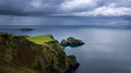Coast of Northern Ireland, distant view of Carrick-a-Rede Rope Bridge