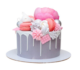Beautiful and elegant grey cake decorated with melted white chocolate, macaroons, pink peony flower and meringues. Idea for wedding or birthday
